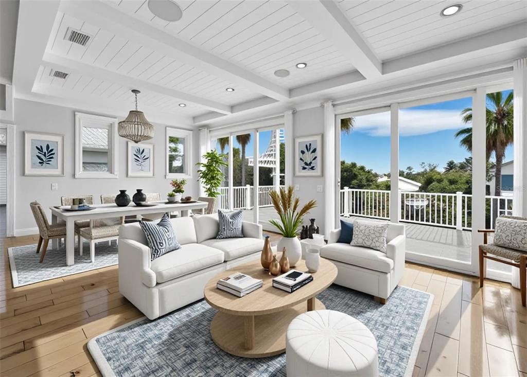 333 Firehouse Court Longboat Key, FL 34228 - Photo 11 of 83 a living room with furniture and a large window