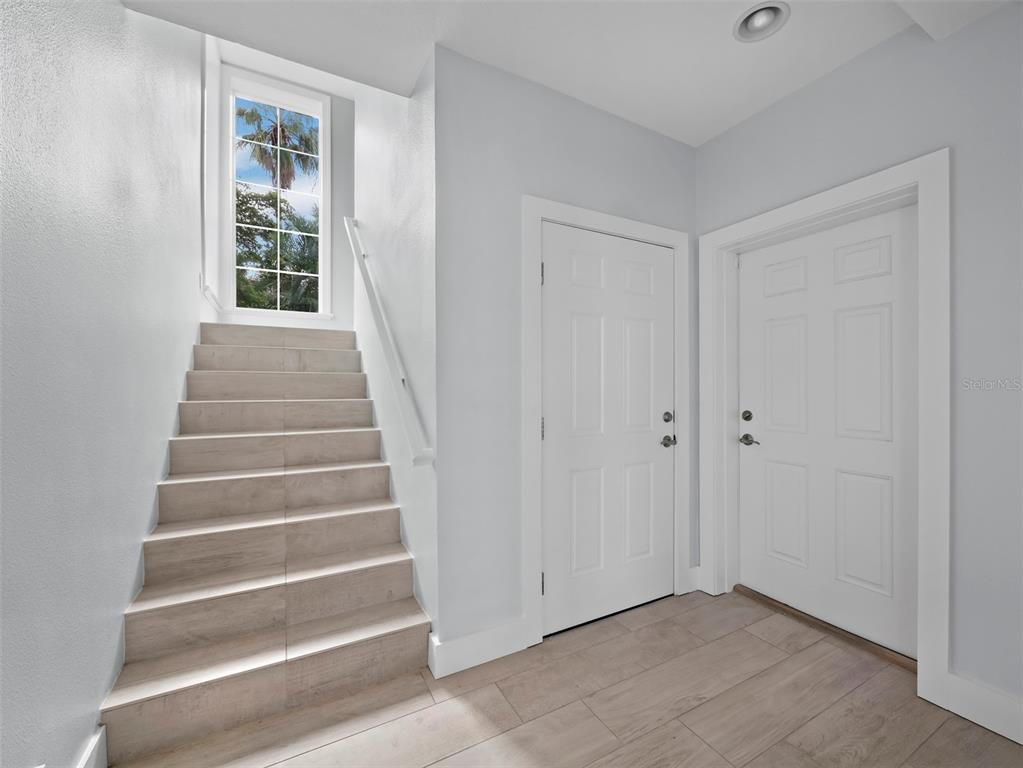 333 Firehouse Court Longboat Key, FL 34228 - Photo 39 of 83 a view of an entryway with staircase