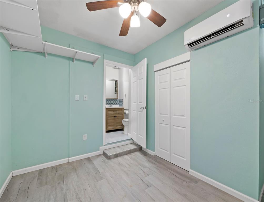 333 Firehouse Court Longboat Key, FL 34228 - Photo 44 of 83 wooden floor in an empty room