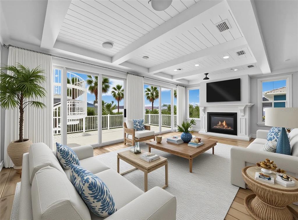 333 Firehouse Court Longboat Key, FL 34228 - Photo 5 of 83 a living room with furniture potted plant and a fireplace