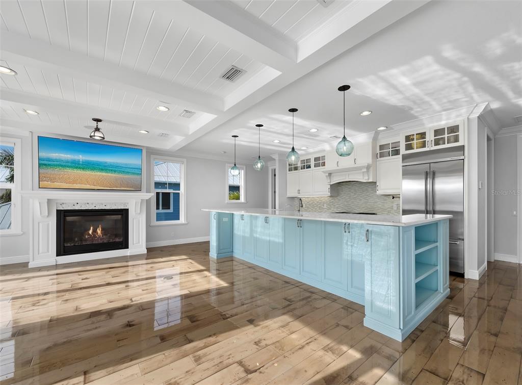 333 Firehouse Court Longboat Key, FL 34228 - Photo 6 of 83 a large kitchen with cabinets and stainless steel appliances