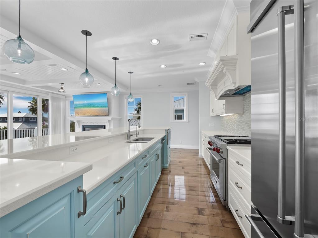 333 Firehouse Court Longboat Key, FL 34228 - Photo 9 of 83 a large kitchen with stainless steel appliances granite countertop a lot of counter space and a sink