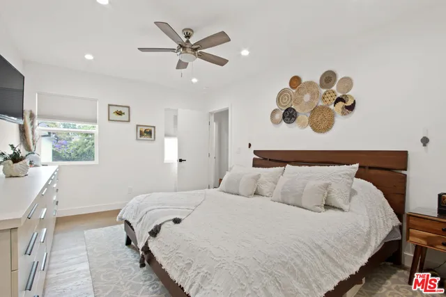 a bathroom with a double vanity sink mirror double and shower