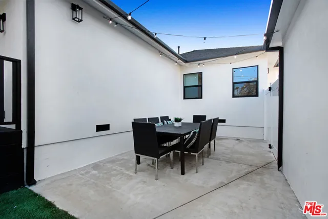 a view of a park with large trees