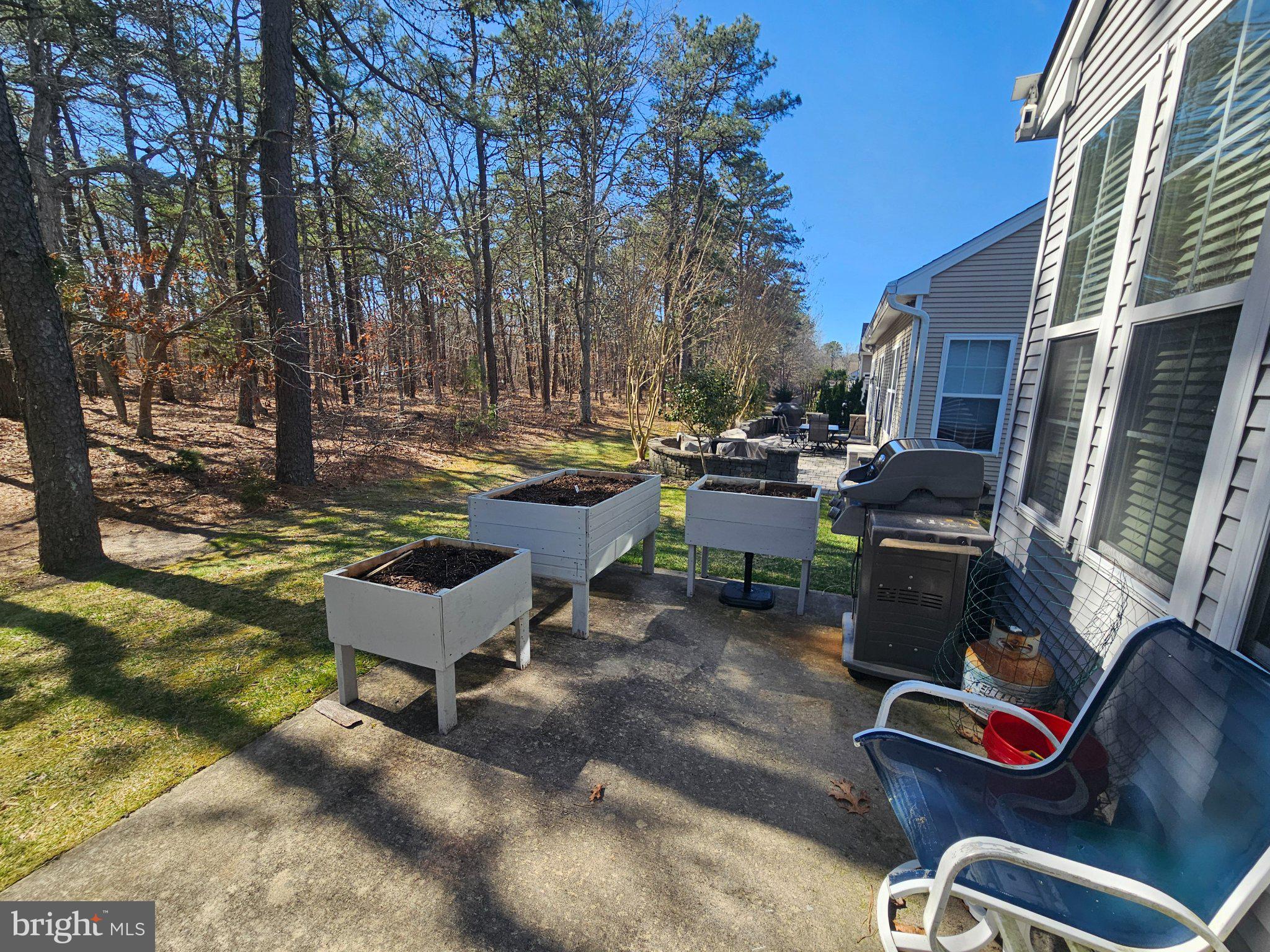 434 Golf View Drive Little Egg Harbor, NJ 08087 - Photo 21 of 24 Serene backyard with garden beds.