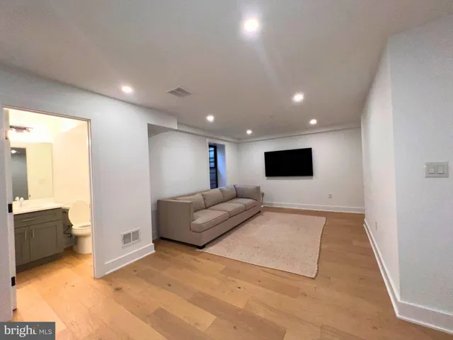 a living room with furniture and a couch