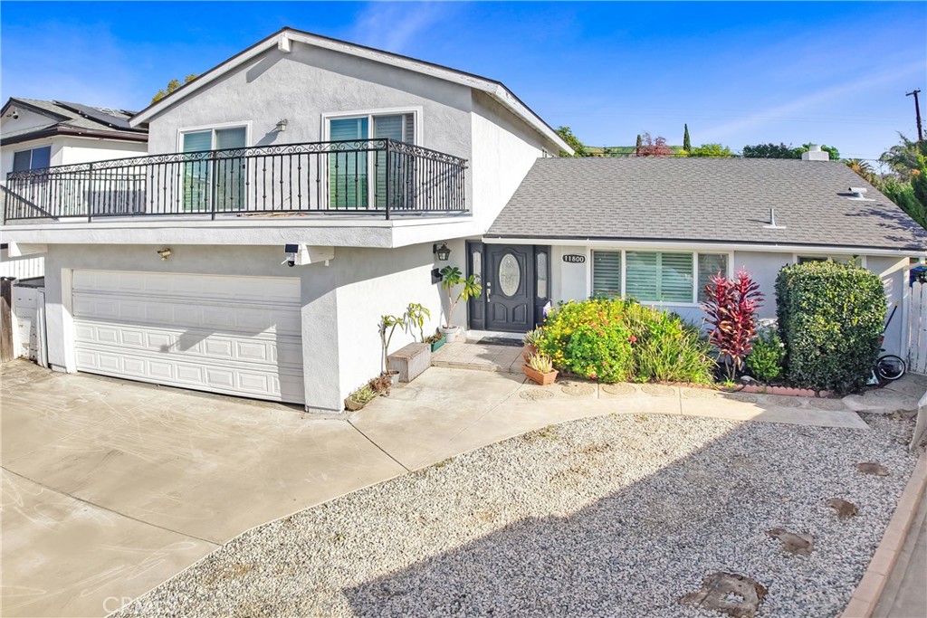 11800 Gager Street Sylmar, CA 91342 - Photo 2 of 25 front view of a house