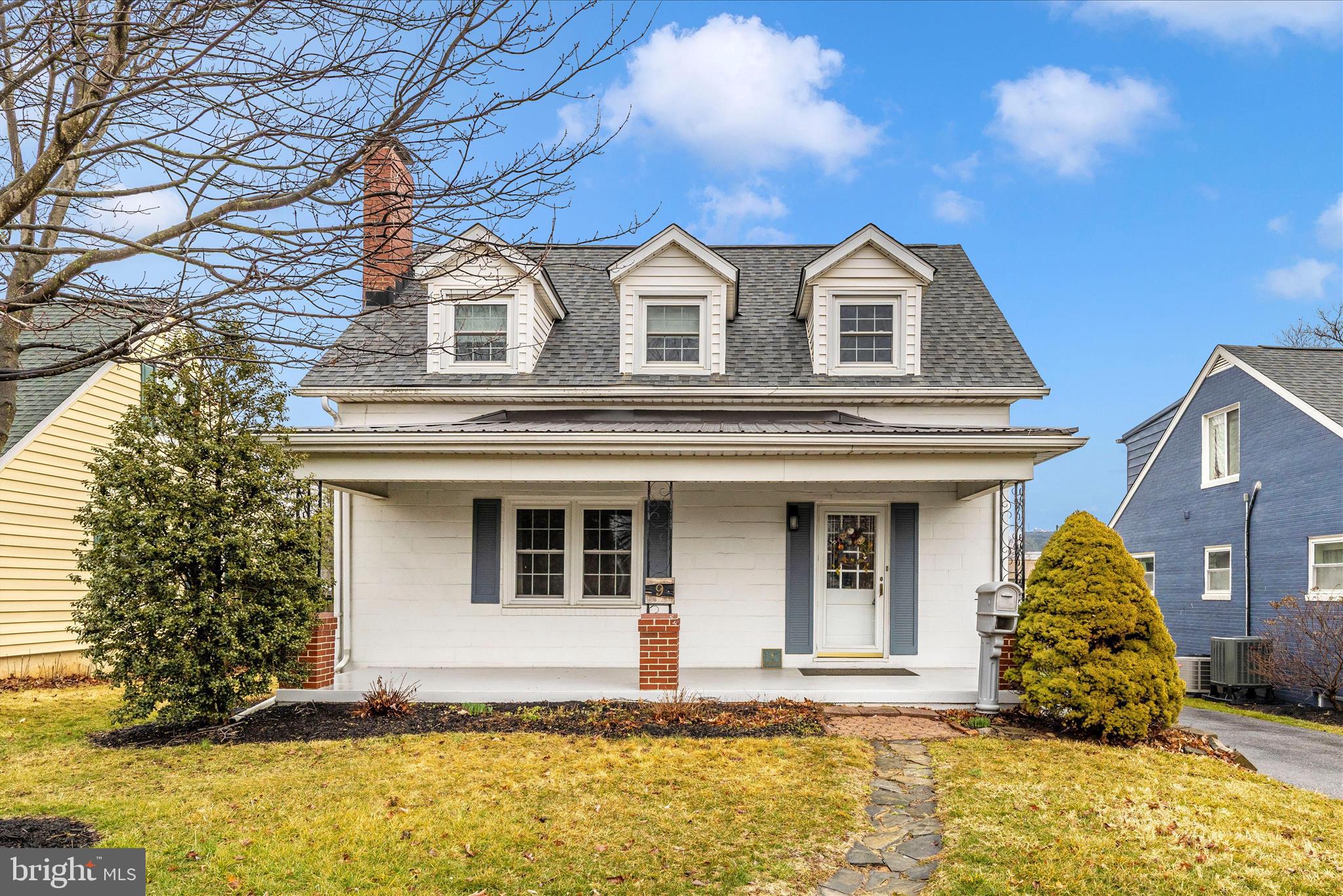 9 East 13th Street Frederick, MD 21701 - Photo 1 of 51 a front view of a house with a yard