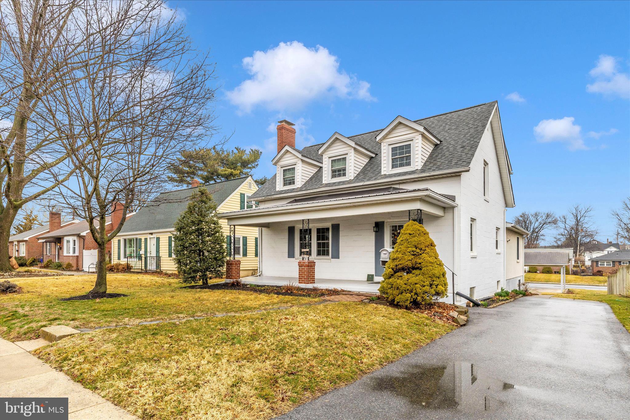 9 East 13th Street Frederick, MD 21701 - Photo 2 of 51 a front view of a house with a yard