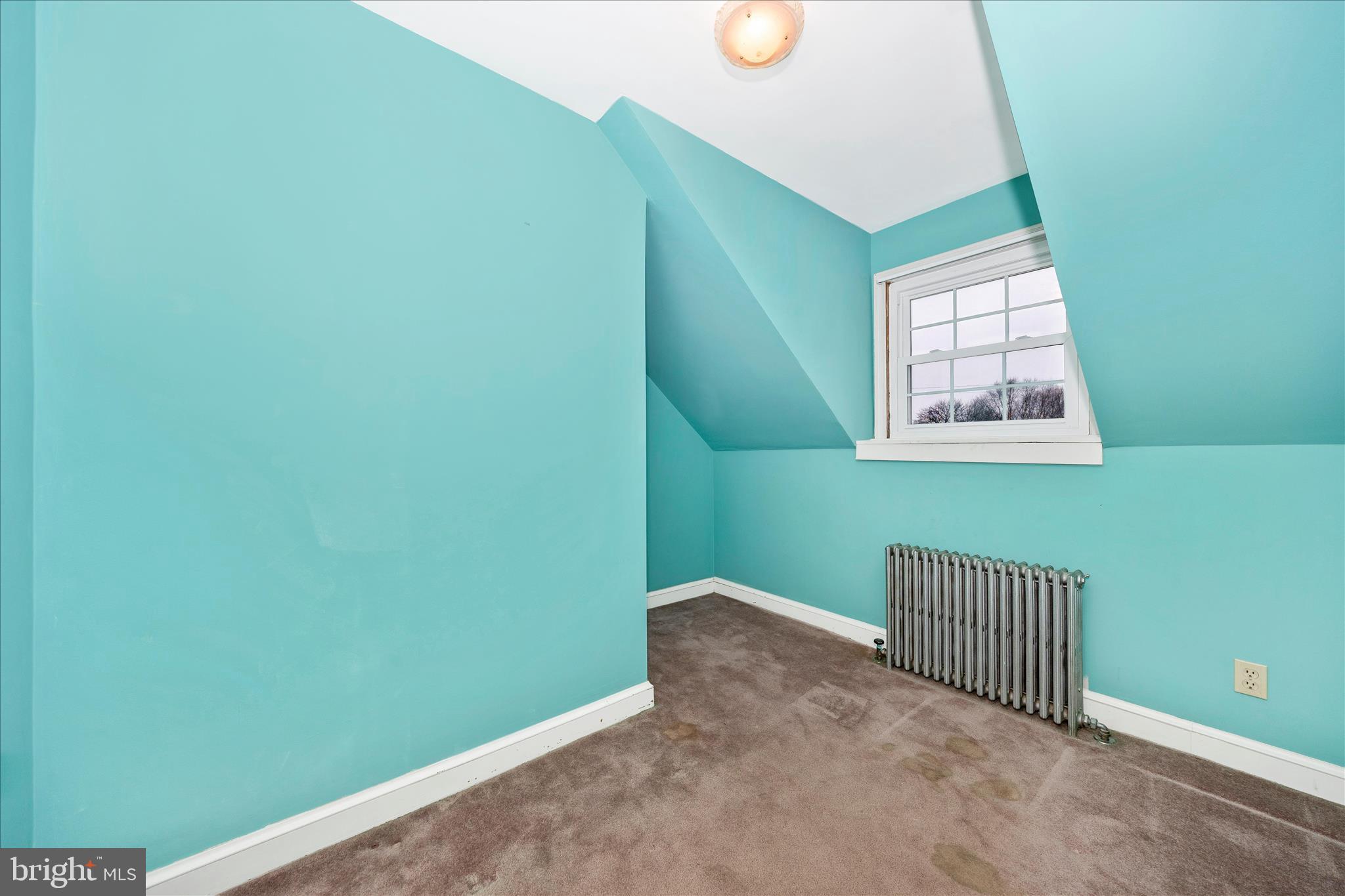 9 East 13th Street Frederick, MD 21701 - Photo 29 of 51 a view of a room with a window and a fan