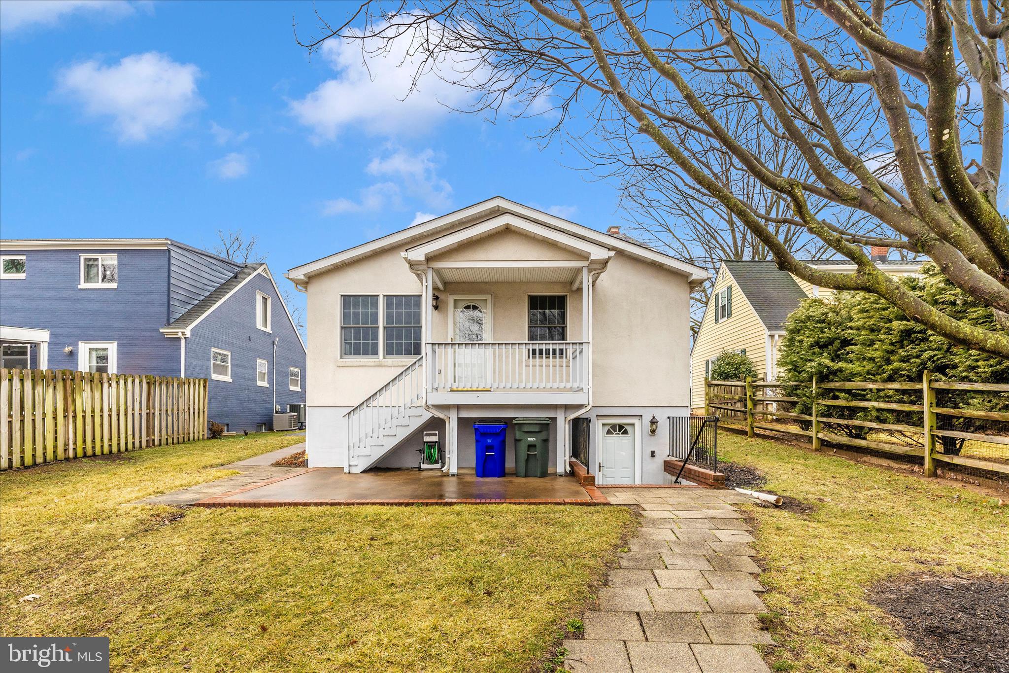 9 East 13th Street Frederick, MD 21701 - Photo 41 of 51 a front view of a house with a yard outdoor seating and garage