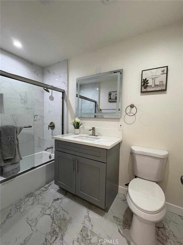 810 West Compton Boulevard, Unit 9 Compton, CA 90220 - Photo 11 of 16 a bathroom with a toilet sink and shower