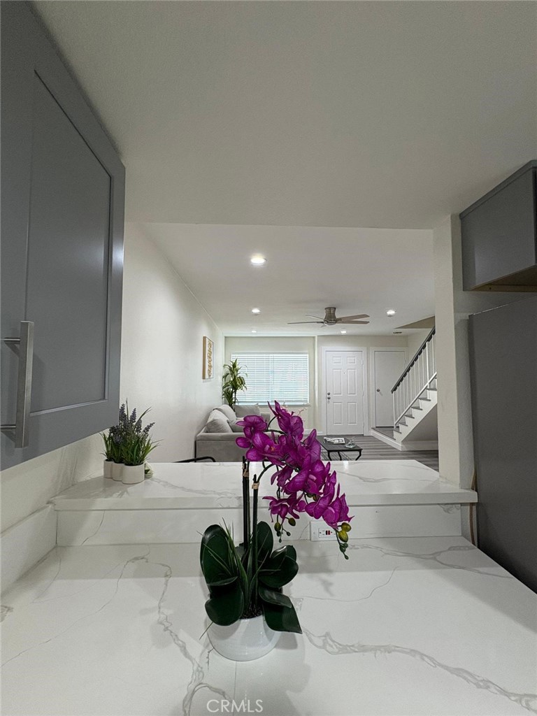 810 West Compton Boulevard, Unit 9 Compton, CA 90220 - Photo 6 of 16 a lobby with furniture and flowers