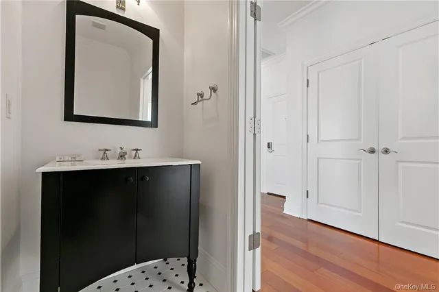 a bathroom with a sink and a mirror