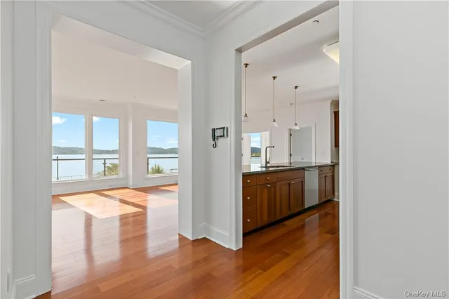 a view of an open kitchen and a window