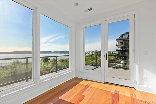 a view of an empty room and window