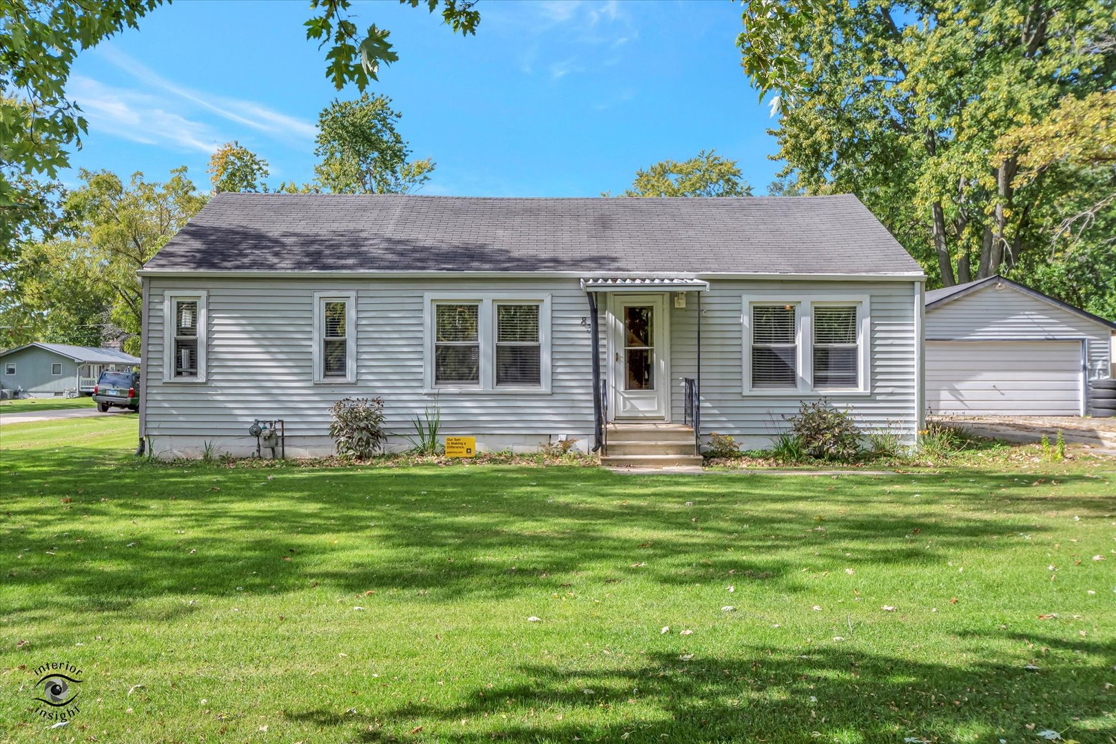 833 South Prairie Road New Lenox, IL 60451 - Photo 1 of 25 a front view of a house with a garden