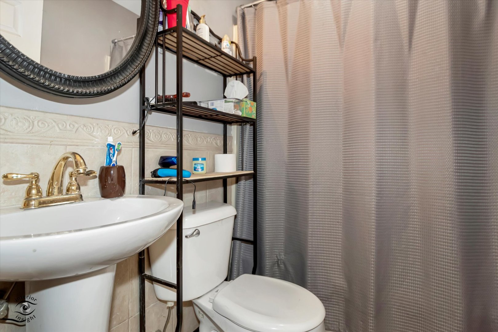 833 South Prairie Road New Lenox, IL 60451 - Photo 16 of 25 a bathroom with a sink a toilet and a mirror