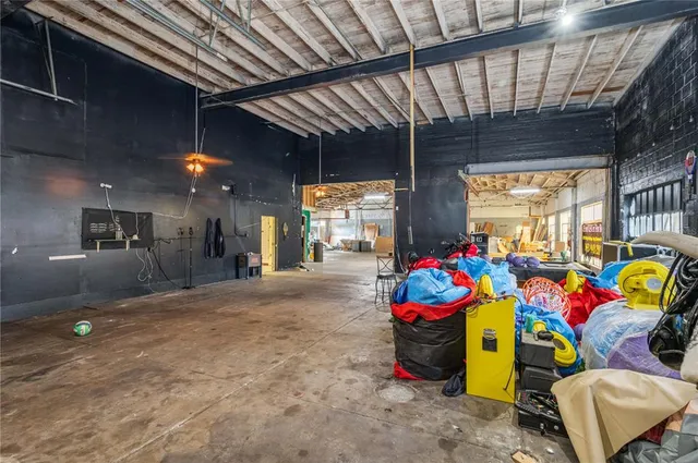 a bathroom with a toilet a sink and a mirror