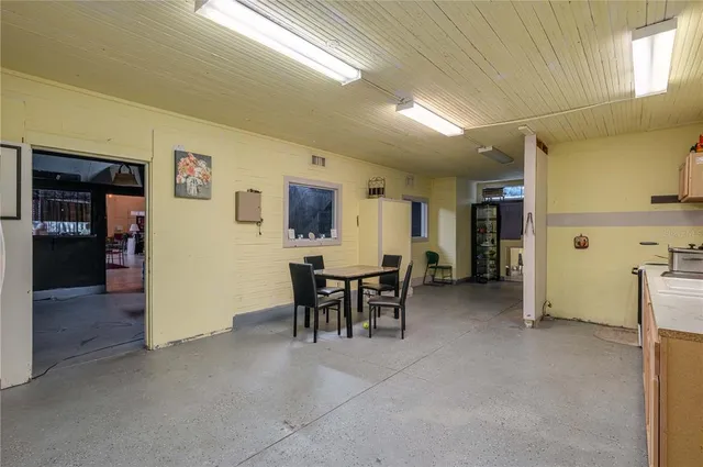 a white toilet sitting next to a bathroom sink