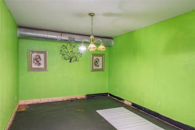 a room with furniture and pool table