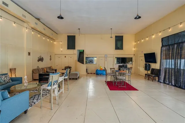 a living room with furniture and a window