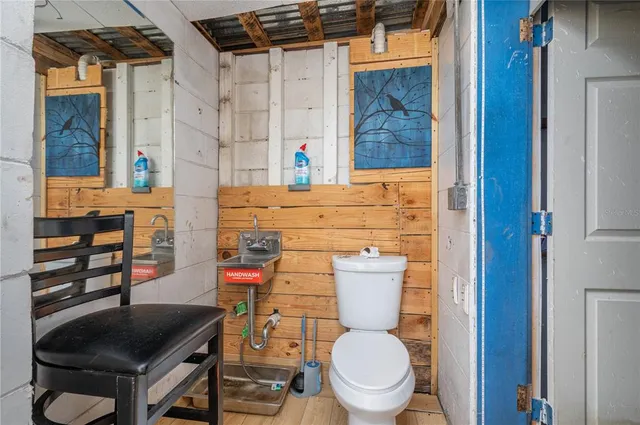 an aerial view of residential building and lake