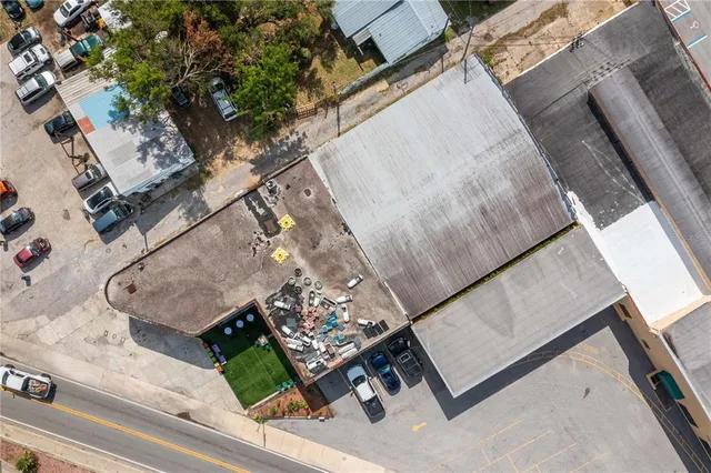 a view of living room with furniture and a chandelier