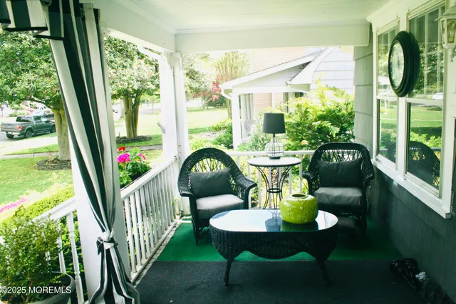 a view of a chairs and table in patio