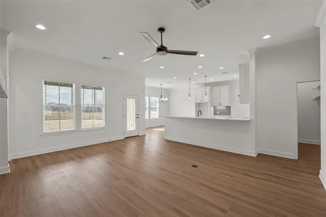 a view of a room with cabinet and stainless steel appliances