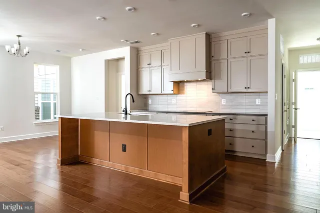 a bathroom with a toilet and a bathtub