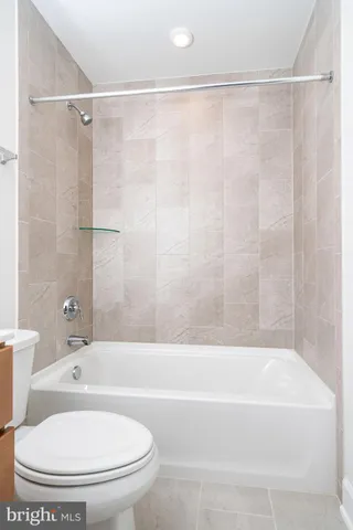 a kitchen with stainless steel appliances granite countertop a cabinets and a stove