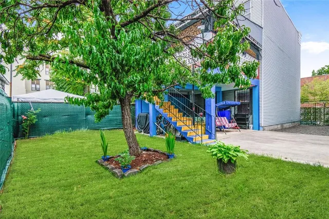 a view of a garden with a slide