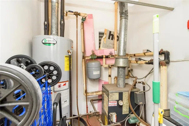 a view of a entryway with furniture and chandelier