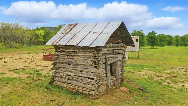 a view of yard with swimming pool
