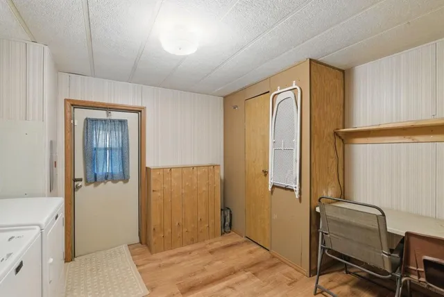 a living room with furniture and painted walls