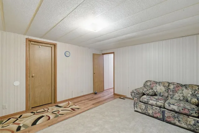 a bedroom with a bed and furniture