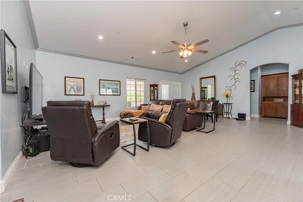 a living room with furniture and a window