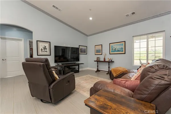 a kitchen with a table and chairs