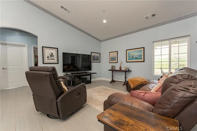 a kitchen with a table and chairs