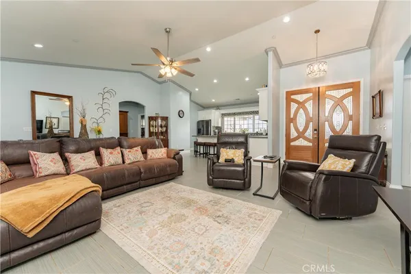 a kitchen with a table and chairs