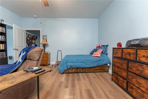 a kitchen with stainless steel appliances granite countertop white cabinets and window