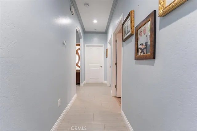 a view of a house with backyard and furniture