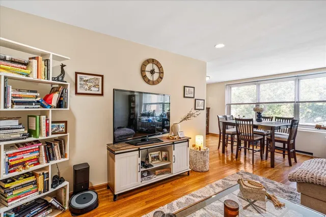 a living room with lots of furniture and a flat screen tv