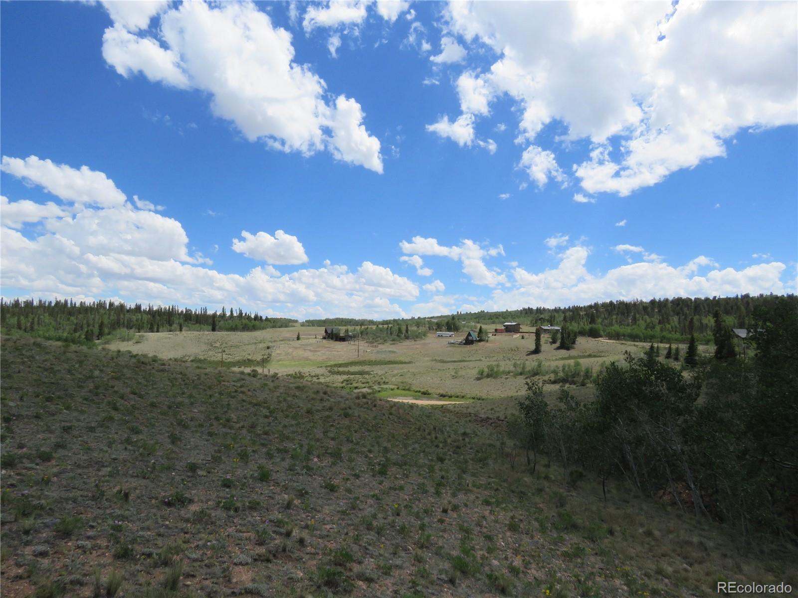 104 Hawk Way Como, CO 80432 - Photo 13 of 19 a view of lake with green space