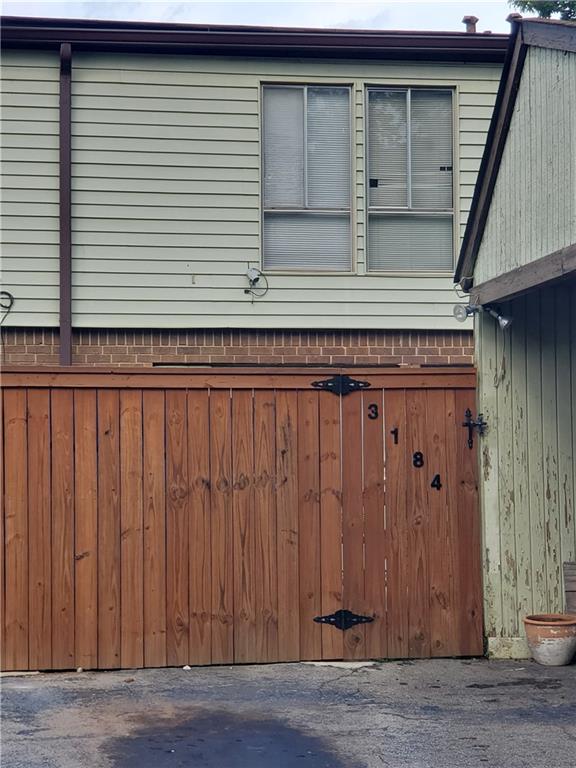 a view of a door and a window