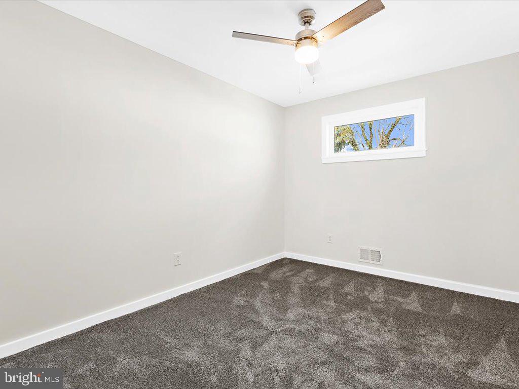 113 Cedar Hill Road Brooklyn, MD 21225 - Photo 12 of 21 New carpet and light fixtures in beds.