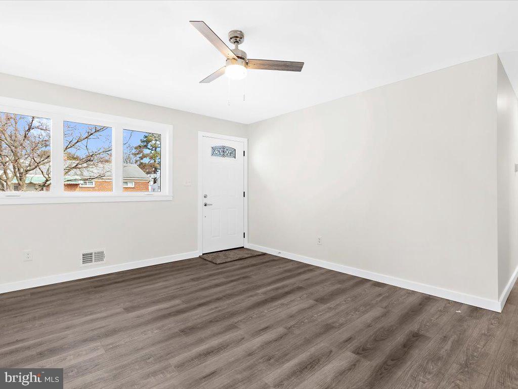 113 Cedar Hill Road Brooklyn, MD 21225 - Photo 10 of 21 New flooring in living room.