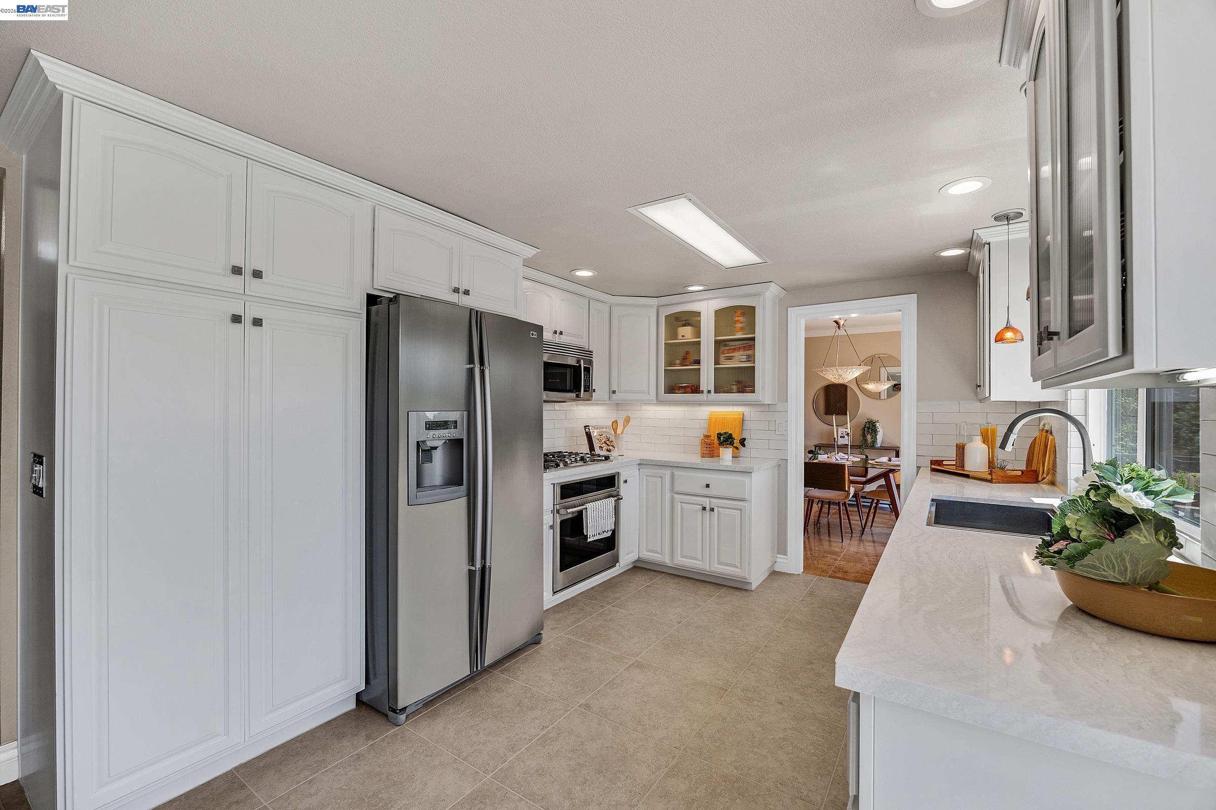 17 Suva Court San Ramon, CA 94582 - Photo 9 of 47 a kitchen with sink refrigerator and cabinets