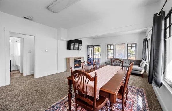 a view of a livingroom and dining room